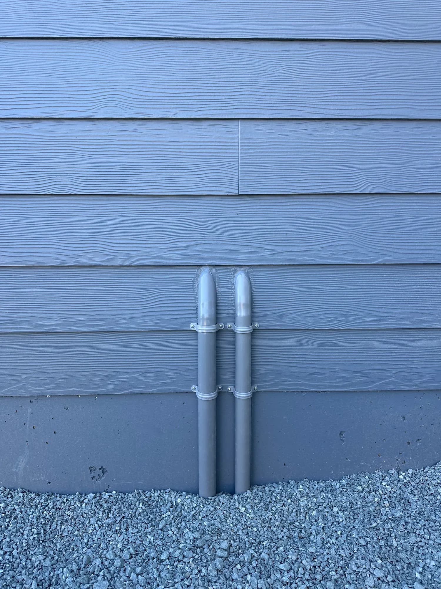 Exterior conduit run cleanly along new siding