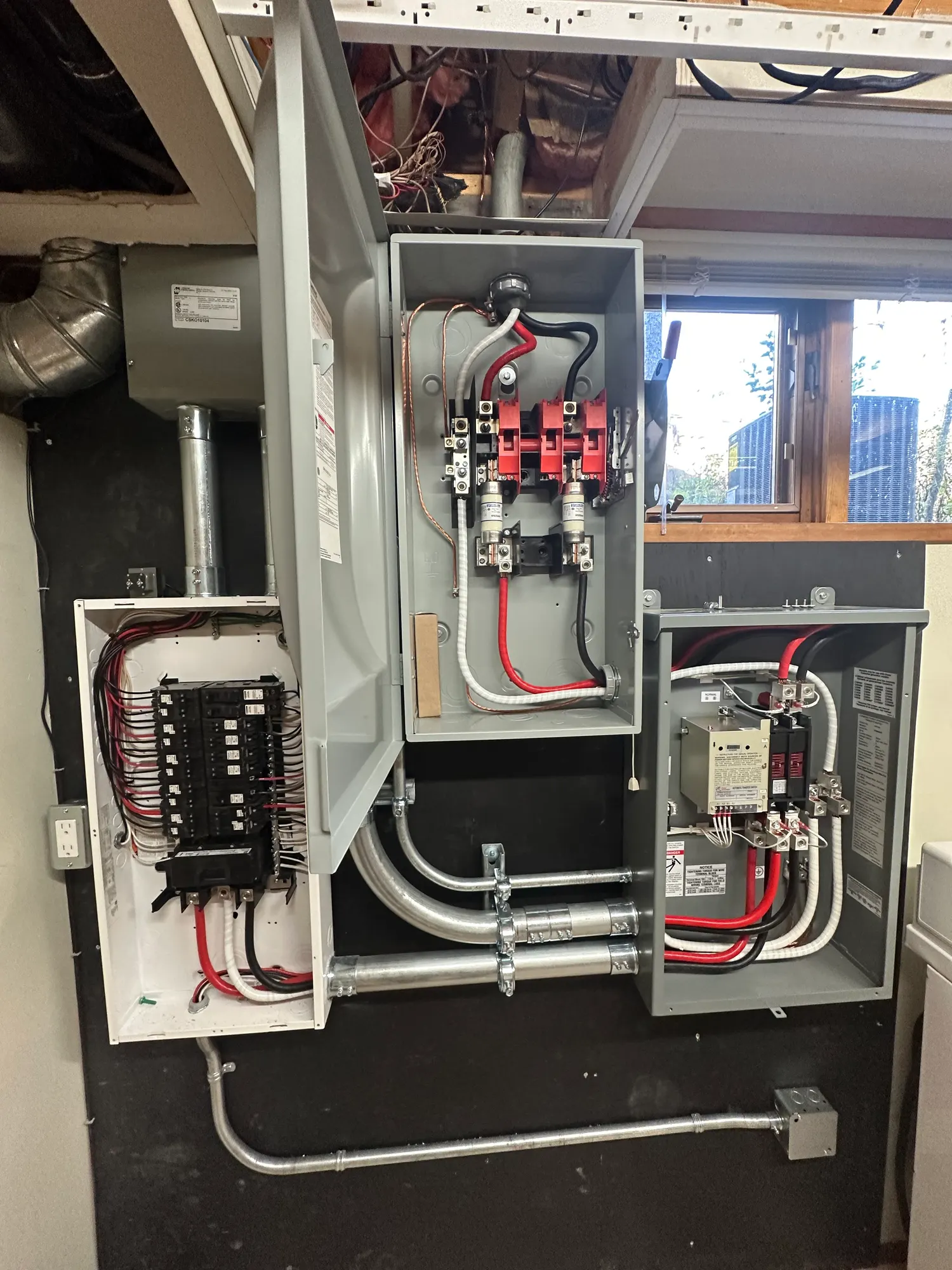 Open transfer switch and sub-panel during installation