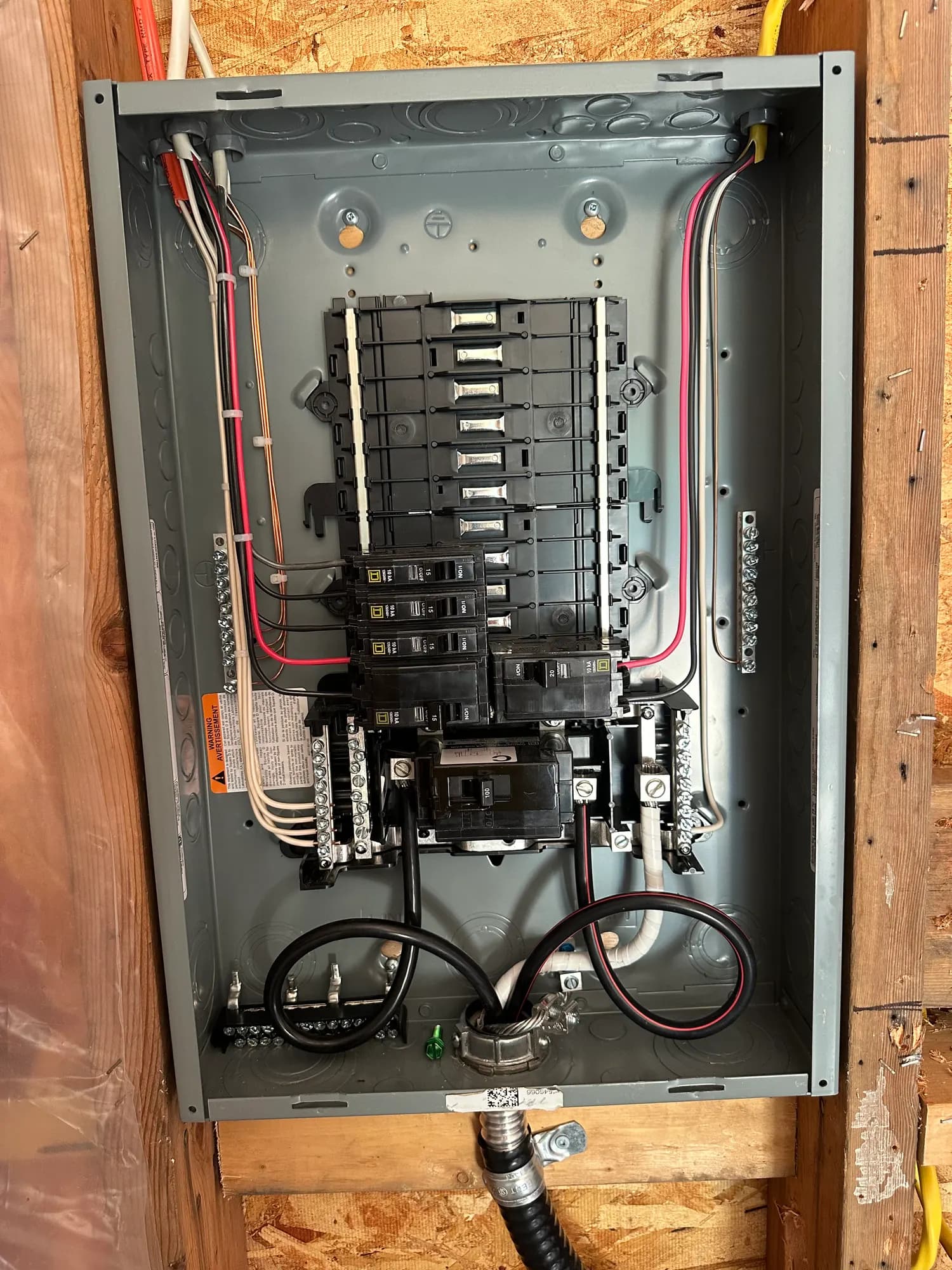 Interior of a newly installed breaker panel before the cover goes on