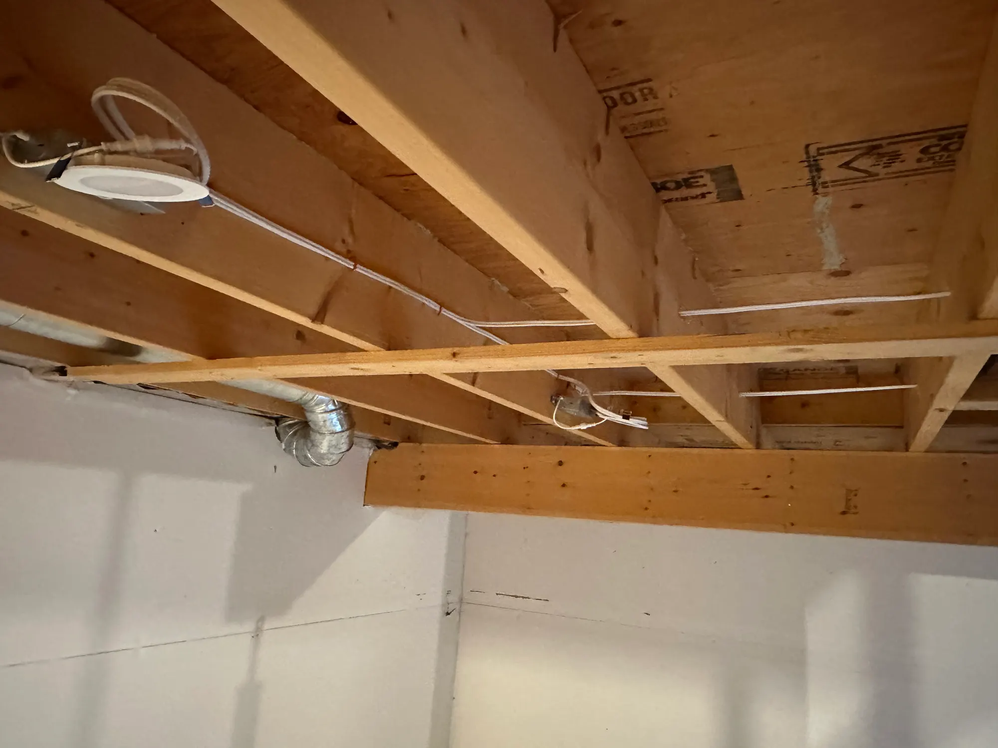 Rough-in wiring and boxes in open ceiling joists
